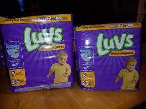 2 Packs of sz 5 Luvs diapers.