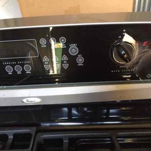 Whirlpool Gold black and gray stove.