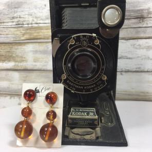 Vintage faux Amber Coro screw backs