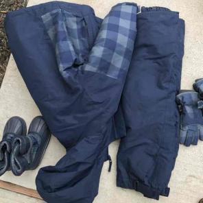 Ski suits and boots