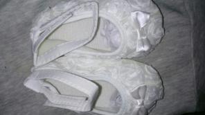 White baby girl's shoe