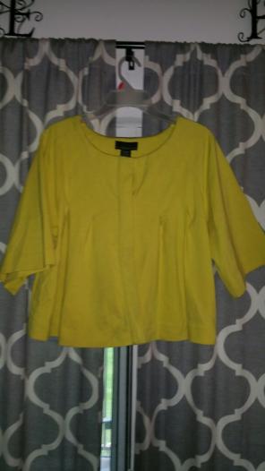 Yellow pleated cape