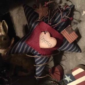 Primitive patriotic star on rusty spring