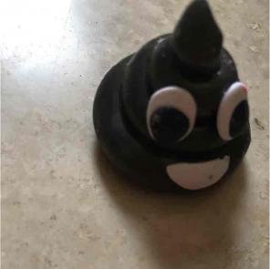 Poop emoji clay figure