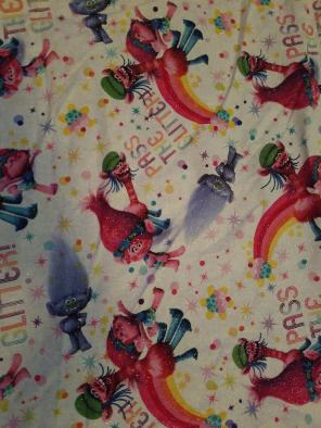 2 yards Trolls Poppy glitter fabric