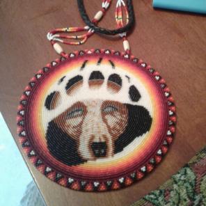 Wolf paw with face