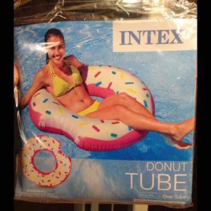 Pink donut pool inner tube