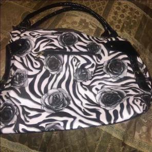 Women's black and white handbag