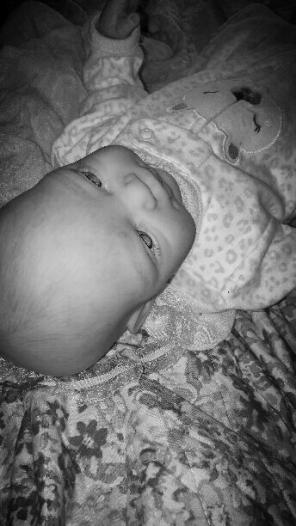 Baby girl vinyl head, limps cloth body