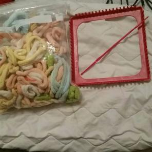 Loom, hook and bag of loops