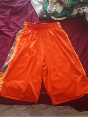 Orange and grey Nike Elite shorts