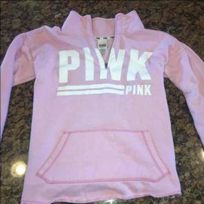 fits like a medium. baby pink color