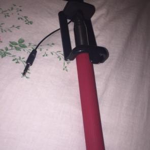 red selfie stick