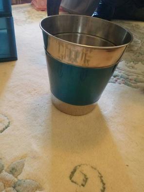 Small blue trash can