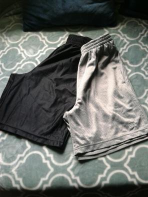 Bundle of men starter basketball shorts