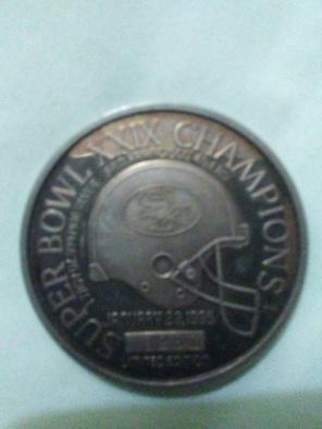 Silver coin NFL super bowl champion