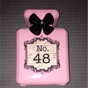 Perfume piggy bank