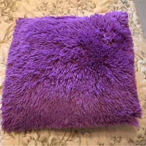 Purple furry pillow