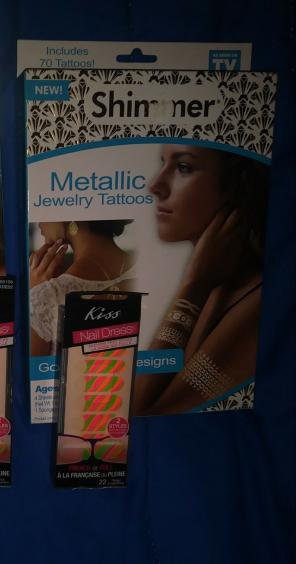 Metallic tattoos and Kiss Nail Dress