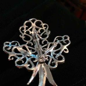 Vintage silver jacket brooch
