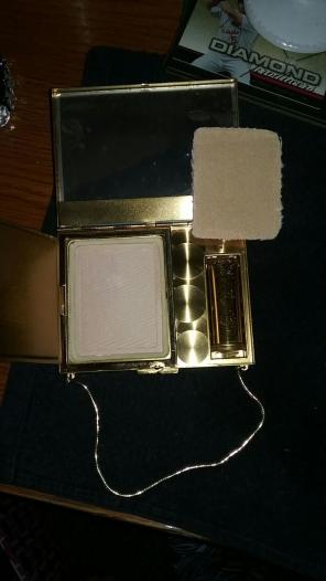 Vintage makeup/ciggerette holder.