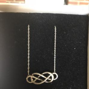 1/6 CT DIAMOND INFINITY PENDANT