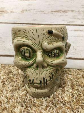 Disney Shrunken Head Trader Sam's mug