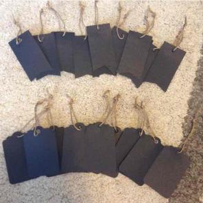21 tags with gray chalk writer