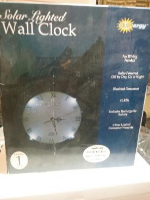 Solar lighted wall clock