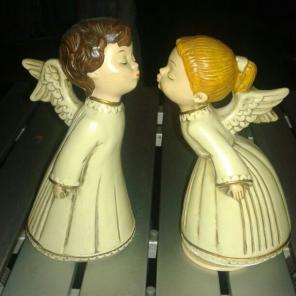 Antique kissing angels