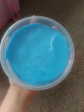 Homeade bright blue fluffy slime
-made w