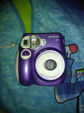 Purple Polaroid camera