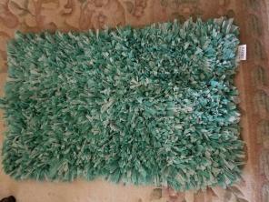light blue rug