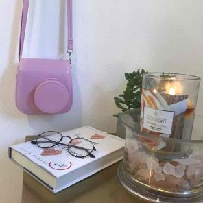 Baby pink instax mini polaroid camera
