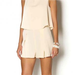 Umgee solid peach romper open back Sz. L