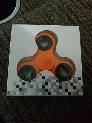 Orange fidget spinner