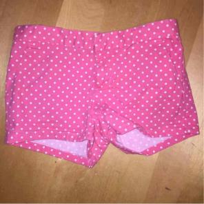 Pink girls shorts with white polka dots