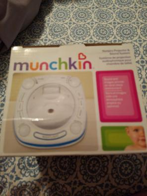 Munchkin nursery projector