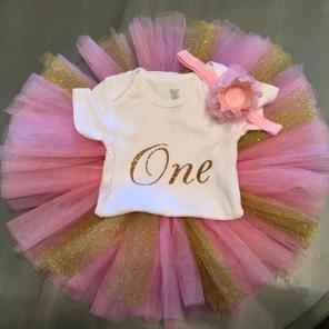 Pink and gold first birthday set