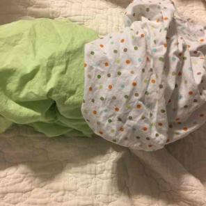 ON HOLD Crib sheets set of two