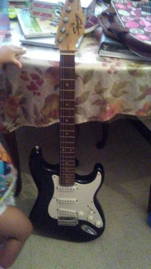 Black electric guitar