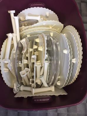 Box Full Of Cake Plates And Columns