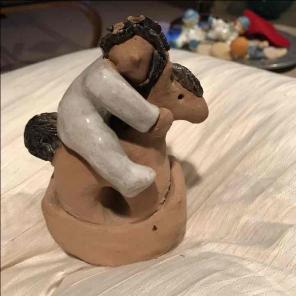 CLay sculpture child and rocking horse