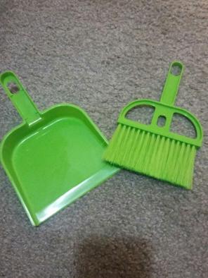 Small dust pan and broom.