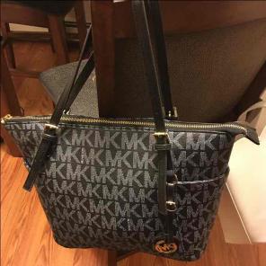 Black/Grey MK purse. Yes it's real.