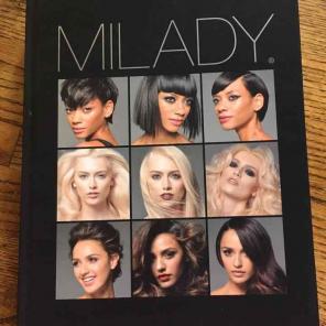 Brand New Milady textbook and workbooks