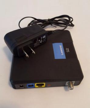 Linksys CM100 Cable Modem w / AC Adapter