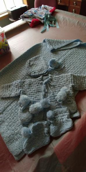 Hand knitted baby layette set