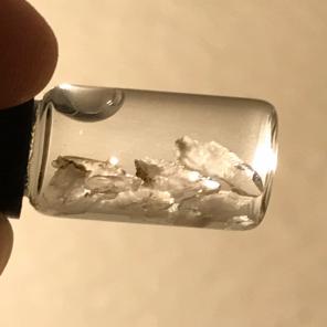 Baby Quartz Crystals In A Glass