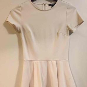 White peplum top